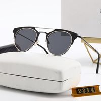 Gafas de sol redondas Diseñador Decorativo Cat Eye Eye Gafas Luxury Drive Gafas EyeGlassess presenta para mujeres