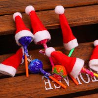 Linda Navidad pequeña lollipop sombrero mini encantador rojo santa sombrero niños navidad regalo decoraciones fuentes de fiesta