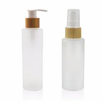 50ml 100ml 120ml 150 ml botellas de bomba de espray a espray de cristal con helada con tapa de bambú para cuidado de la piel Loción de suero Loción de champú Gel de ducha