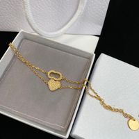 Collier de concepteur pour Woaman Lettre Diamond Pearl Love Heart Bracelet de luxe Produits Colliers Chaîne Qualité De Qualité Mode Bijoux