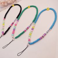 Mobile phone lanyard short hand-made love beaded pendant smiley face circle mobile phone case anti-lost sling fashion ornament