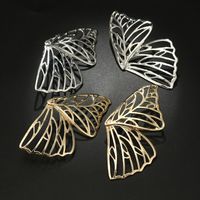 Womens Unregelmäßige geometrische Ohrringe Legierung Metall Schmetterling Hohl Ohrringe Damen Kostüm Schmuck Vintage