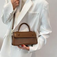 أكياس الكتف حقيبة المرأة 2021 الموضة النمطية المحمولة الصغيرة اليومية المحفظة عملة معدنية غير رسمية أنثى الصليب الجسد الأسود