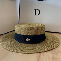 Breda rand hattar ht261 damer sol liten bee strå hatt europeisk och amerikansk retro guld flätad kvinnlig solskydd platta cap visorer