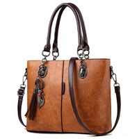 bag Luxury designs Women Handbags Big Solid Leather Tassel C...