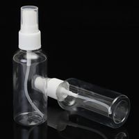 Botellas de embalaje 5pcs / set 60 ml de plástico transparente spray portátil botella rellenada de perfume vacío bomba de niebla atomizador de viaje