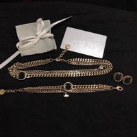 Colgantes chapados en oro Collares Choker Joyas Conjunto Pendientes Pulsera Collar de moda para mujer Suministro de cadena larga de alta calidad