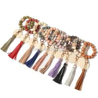 Nouveau cadeau Beads en bois Bracelets de haute qualité Lepoard Lepoard glands bracelets Bracelet sac Pendentif Decor Party Favoris DD