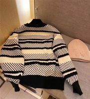 Lana de gran tamaño de punto de punto largo espesado suéter de lana de lana de caída de lana de niñas con letra grande camisa de punto de manga, ropa de moda suelta