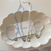 Ketten Aomu Korea Vintage Blau Weiß Transparent Harz Herz Schlüsselbein Kette Süße unregelmäßige geometrische Perlen Halskette für Frauen Mädchen