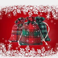 10 * 14cm Jul godis gåvor Förpackningspåsar bomull Drawstring Xmas Presentförvaring Väska Tryckt Snowflower Små säckar