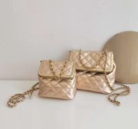 مصمم صندوق الإطار المعدني للنساء العلامة التجارية الجديدة الشهيرة منقوشة الكتف حقيبة لحاف صغيرة الإناث المحافظ اليد