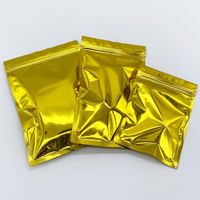 500ピースの再封鎖可能な金のアルミホイルの包装袋のバルブロック乾燥食品ナッツ豆の包装袋包装袋