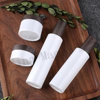 Lagerflaschen Gläser 100ml Perlenweißglaslotion Flasche mit Holzkorndeckel für Emulsion / Grundlage / Essenz Hautpflege nachfüllbar