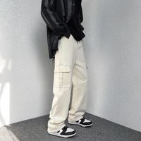 Jeans de hombre primavera hombres hip hop de gran tamaño de carga recta jean pantalones 2022 para hombre simple streetwear streetwear grandes bolsillos de mezclilla