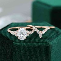 Cxsjeremy 14k Rose Gold Bridal Set 1,5ct Oval Cut 6 * 8mm Moissanite Engagement Ring Bröllop Band Kvinnor Antika Ringar