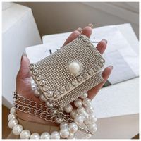 Bolsos de hombro mini bolsas de alta calidad hembra 2021 moderna cadena de perlas versión coreana de la cintura cruzada de diamantes de dhinestone cofre