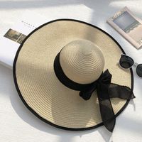 Amplio sombreros de ala de las mujeres verano Big 15cm cinta arco elegante sol paja bóveda playa protección al aire libre panama