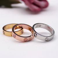 Mai dissolvenza di alta qualità di alta qualità di alta qualità anello di amante taglia 6-12 cz pietra oro argento rosa colori in acciaio inox donne gioielli donne all'ingrosso