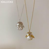 Naszyjniki wisiorek Xialuoke Vintage Metal Umchnij Barokowe Pearl Pearl Naszyjnik Dla Kobiet Prosta Elegancka Biżuteria