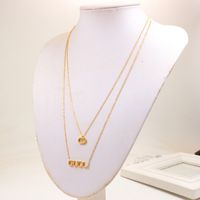 Hip hop girls boys High quality easy chic Design necklace double long letter sweater chain fashion love letter 316L stainless steel women wedding jewelry wholesale