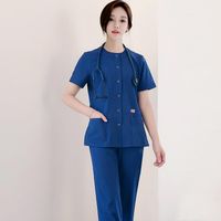 Donne manica corta infermieristica uniforme da lavoro set di uniforme di colore solido cypping girocollo top e pantaloni che scrub femminili si adattano a due pezzi delle donne