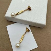 Charm de oro Cuelga Pendientes de diseño Lujoso Redondo Perla Pendiente de perla para mujer Joyería Letra Estrella Bola Moda Dama Fiesta Boda