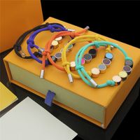 Mode 6 farben bunte schnurde charme armband mit string perlen stränge in geschenk retailkasten sl01