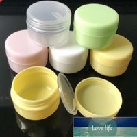 10 pz / set Bottiglie ricaricabili in plastica trucco vuoto trucco vaso vaso da viaggio crema per il viso / lozione / contenitore cosmetico 5 colori 10g