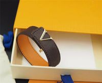Dropship moda clássico marrom pu pulseira punho com logotipo de metal no presente caixa de varejo stock SL08 OTTIE