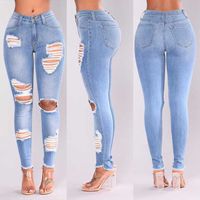 Женские джинсы внешней торговли Онлайн знаменитость Slim Fit с отверстиями экспортировки кисточек для ноги рта тощие штаны