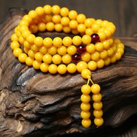 Beeswax budista brazalete pulsera 108 ámbar suéter cadena de pollo mantequilla amarillo amarillo hombres y hembras