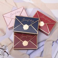 5pcs / lote caja de regalo Caja de regalo Cajas de papel de caramelo Empaquetado con asa galleta Chocolate Macarrones Fiesta de bodas Favors WRAP