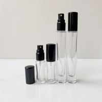 100pcs / lot 10 ml de flacons de parfum clair en verre épais avec atomiseur d'aluminium Etui cosmétique vide pour usage de voyage