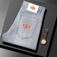 Luz 2022 Luxo Moda Europeia Masculino Jeans Elástico Lazer Slim Fit Pequeno Pegada Flor Primavera e Verão Estilo