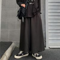 Męskie spodnie instudios moda japońska retro luźna szeroka noga czarna knickerbockers Capris dla mężczyzn i kobiet