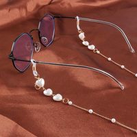 Солнцезащитные очки Рамки 2021 Мода Очки для чтения Золотая цепочка для женщин Металлические шнуры Ультрамодный жемчужный eyeglass