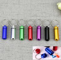 7 Farben Metallbehälter Keychain Aluminium Pille Box Halter Tragbare Multifunktions Erste-Hilfe-Pillen Schlüsselanhänger Flaschen Schlüsselring Dichtungssatz