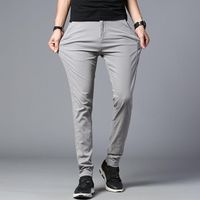 Pantalones para hombres 2021 Primavera Verano Casual Hombres Algodón Slim Fit Pantalones Moda Business Design Solid Grey Black Plus Tamaño 38