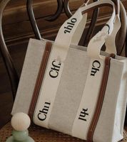 DQQ lüks tuval kadın tasarımcı çanta paketlenmiş olmalı moda çanta çanta messenger çanta sırt çantası çanta