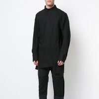 Camisa de los hombres de manga mediana y larga de la sección de diseño irregular de diseño negro de una sola pecho camisas casuales de la ropa de peinado