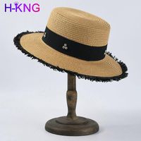Primavera verano sombrilla pura color plano panama rafia hembra sombrero exquisito diamantes de imitación damas anchos sombreros de ala