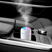 ホーム車のためのカラフルな夜の光が付いているポータブル300mlの空気加湿器USBの霧のメーカーの電気アロマオイルの拡散板噴霧器