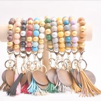 Braccialetto per perle di legno perline del commercio estero Keychain Blank Disc Tassel Portachiavi Pendente Pure Multicolor opzionale