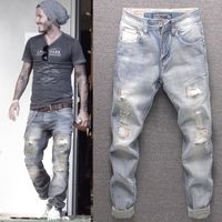 Europäische und amerikanische Retro-Jeans Herren-Nähte Bettlers alter Patch lose gerade lange Hosen Persönlichkeit Mode Marke Lokomotive
