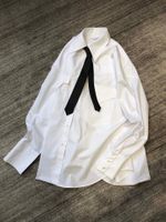 Station européenne de style preppy Chemise double poche pour femmes 2021 printemps polyvalent style lâche cravate décontracté blanc manches longues