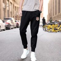 Sports pants men&#039;s casual foot binding fashion Korean version guard Pants Black work for summer and Autumn Y0811