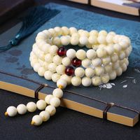 108 Beeswax Pulseras de múltiples círculos Mantequilla de pollo Amarillo Amber Blanco Honey Beads para hombres y mujeres Strands