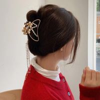 ヘアアクセサリーゴールドメタルバタフライタッセル女性爪カニバスクリップファッション幾何学クリップ