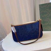 Canvas Vintage Blue Brown Kvinnors väska Klassisk bokstäver Tryckmönster Kvinnors handväska med tunn läderstjärna denim modeväska